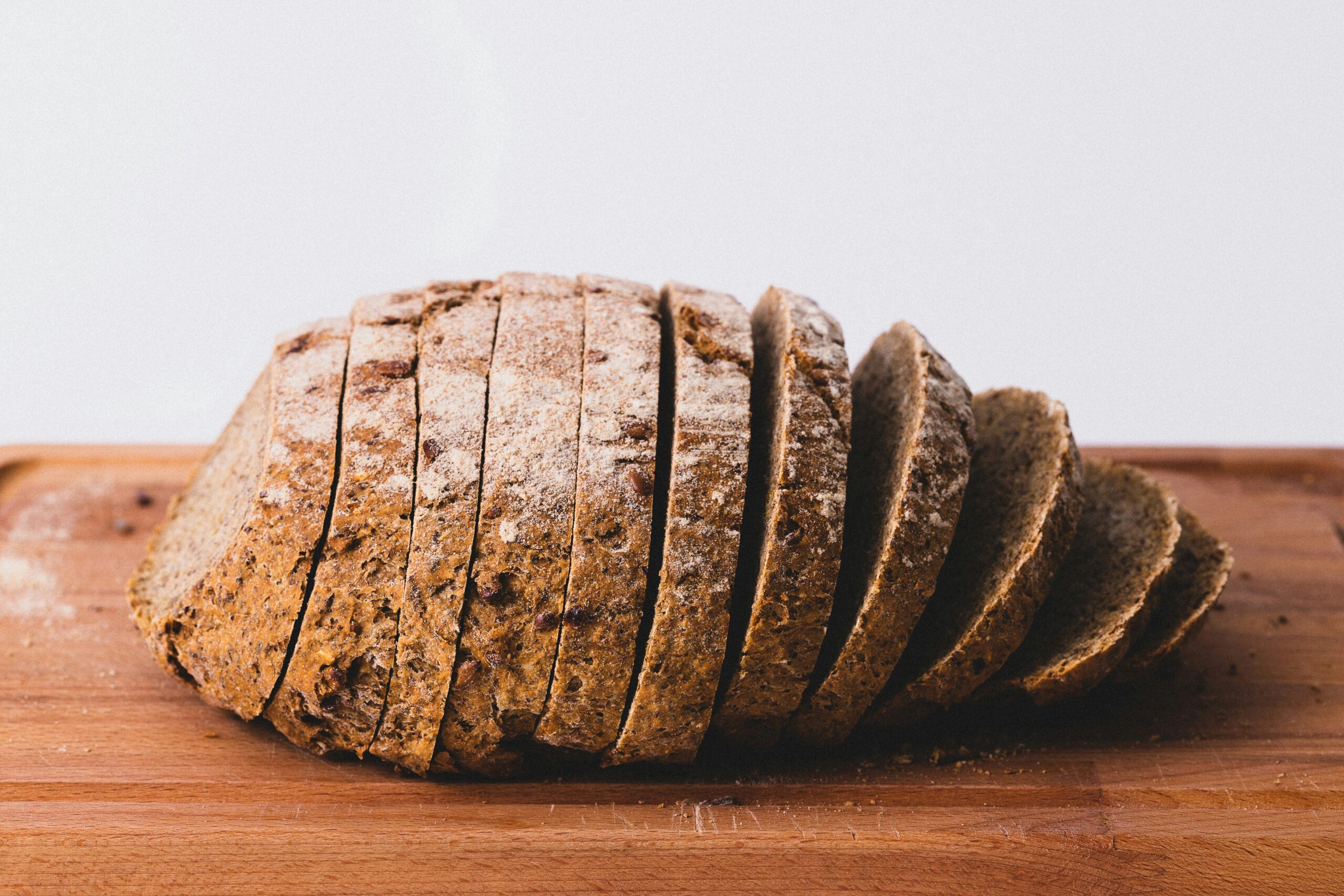 a sliced loaf of bread on a cutting board